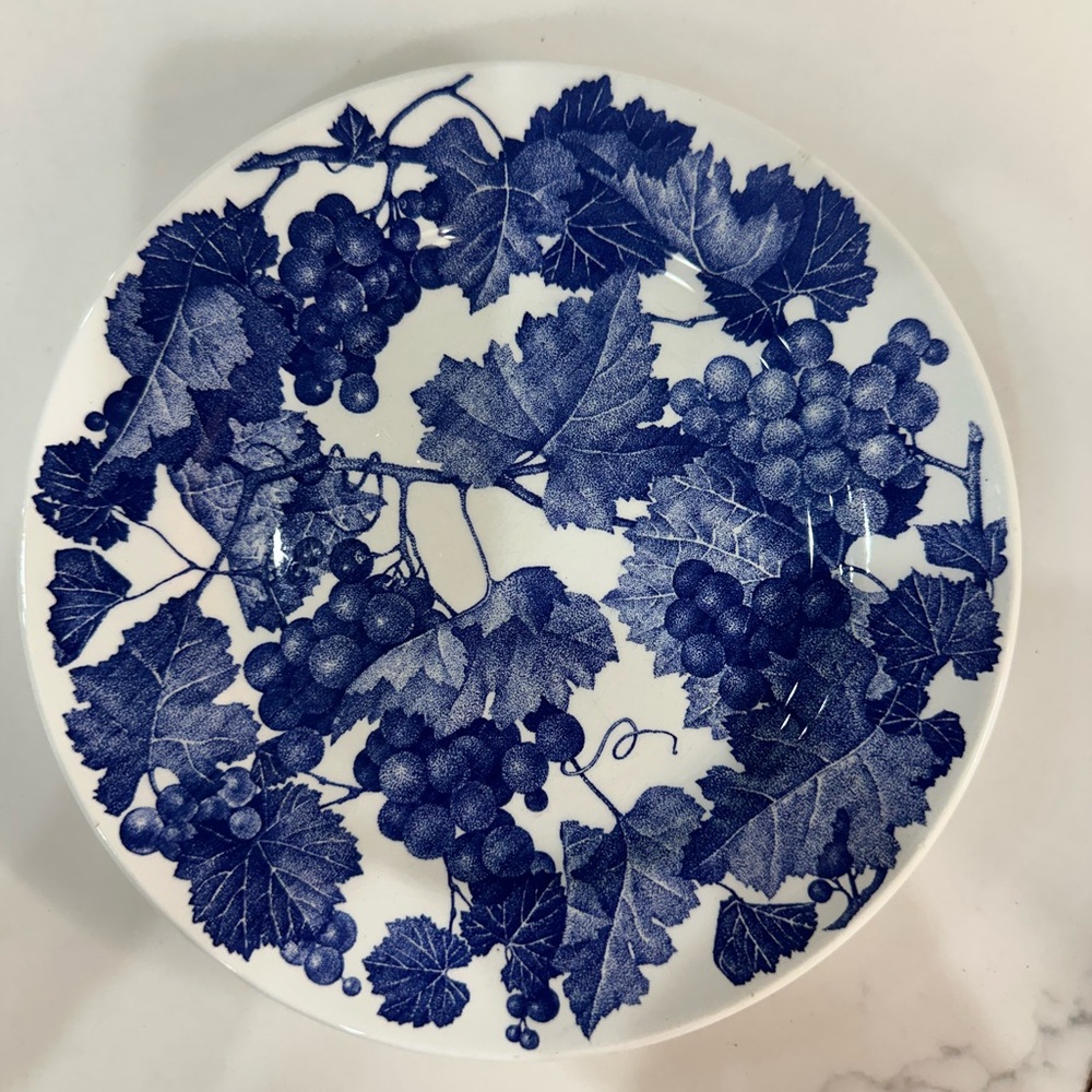 Four Crate and Barrel and Windsor Blue and White Grapevine place settings